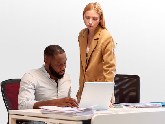 Two people working at a office