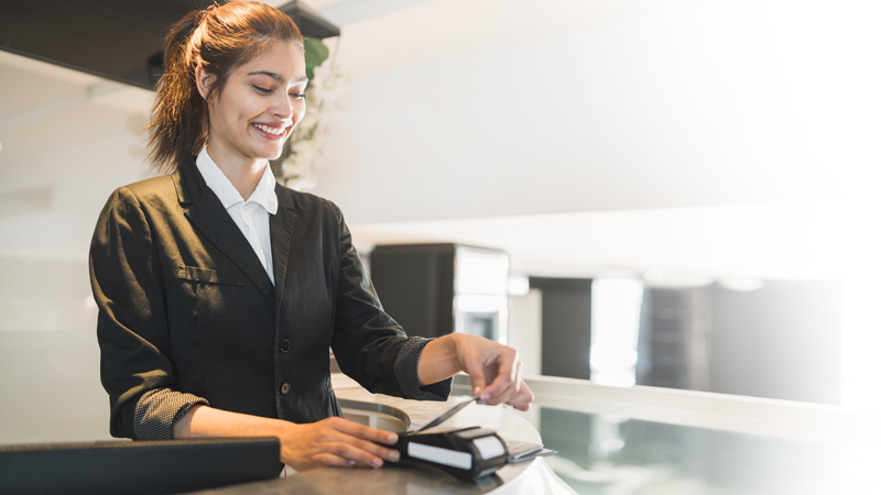 Woman smiling at counter