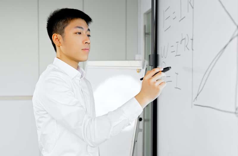 Man using an interactive whiteboard